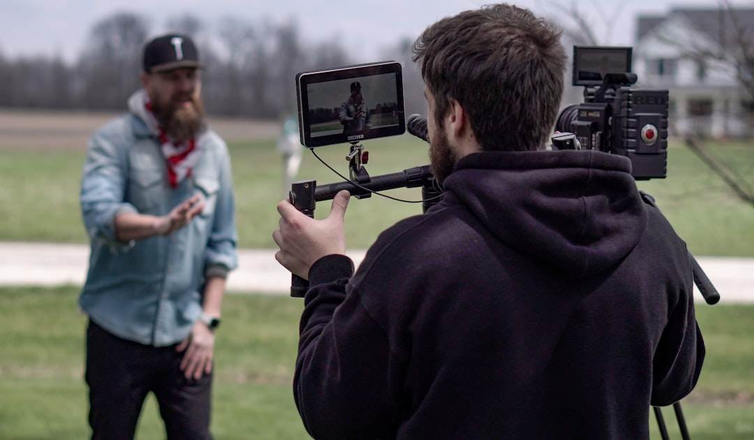 Creator filming vertical video outdoors