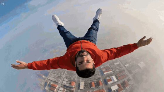 The falling man cuts from a photograph to a paper-cut to an inked drawing to a 3D cartoon, each look lasting under a second except the last, with his jacket red and his arms spread throughout.