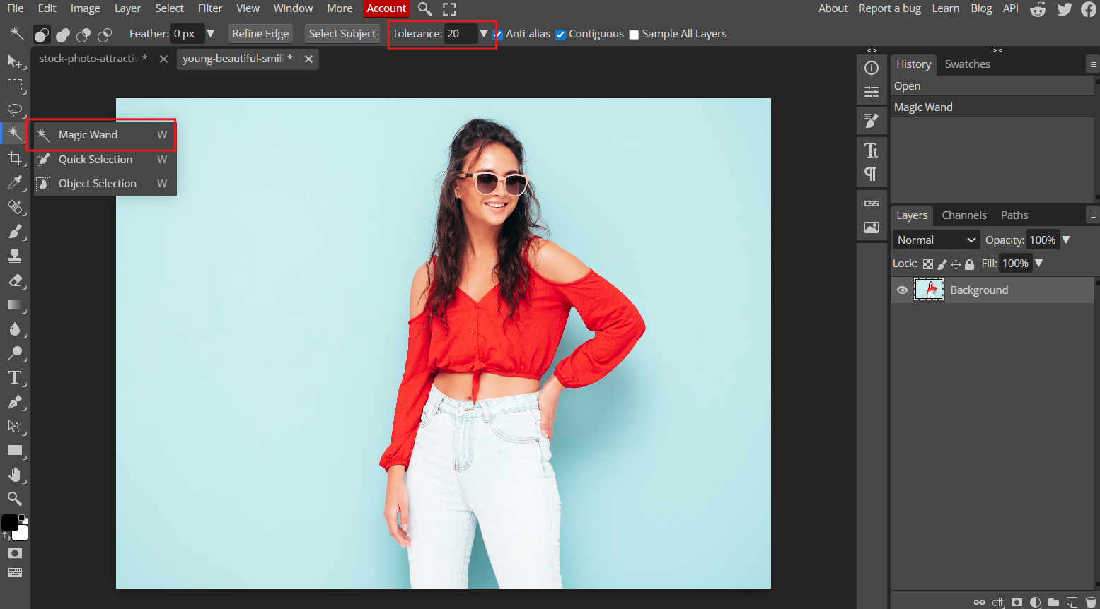 Access Magic Wand tool and select background