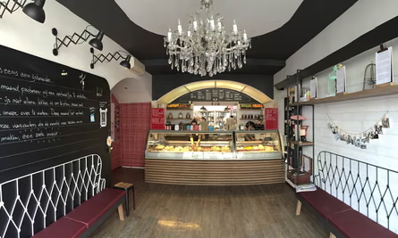 Elegant ice cream shop with antique mirrors and chandeliers