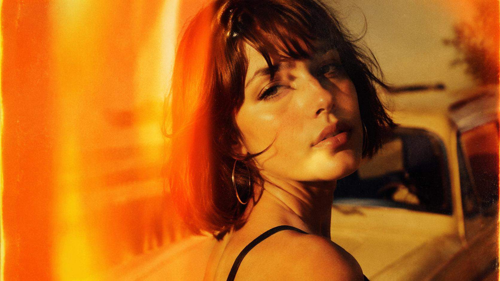 Dreamina film burn filter prompt example 2: Retro orange film burn