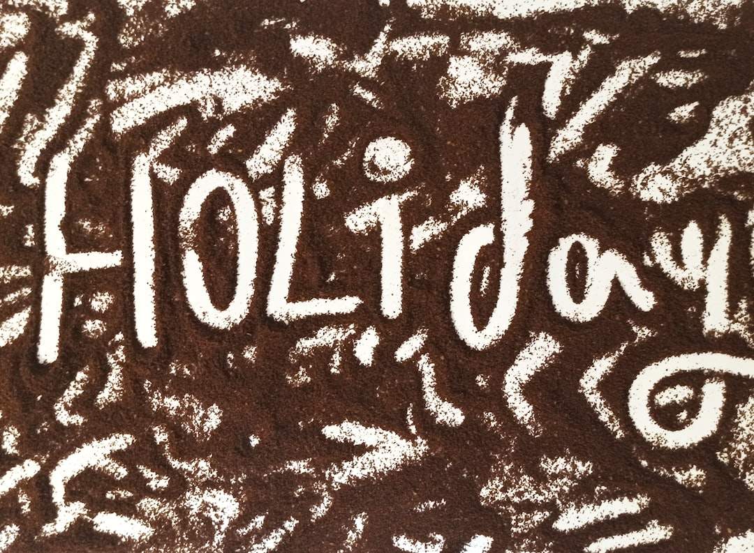 A sleek, modern holiday card with a simple 'Happy Holidays' in a stylish font on a plain background
