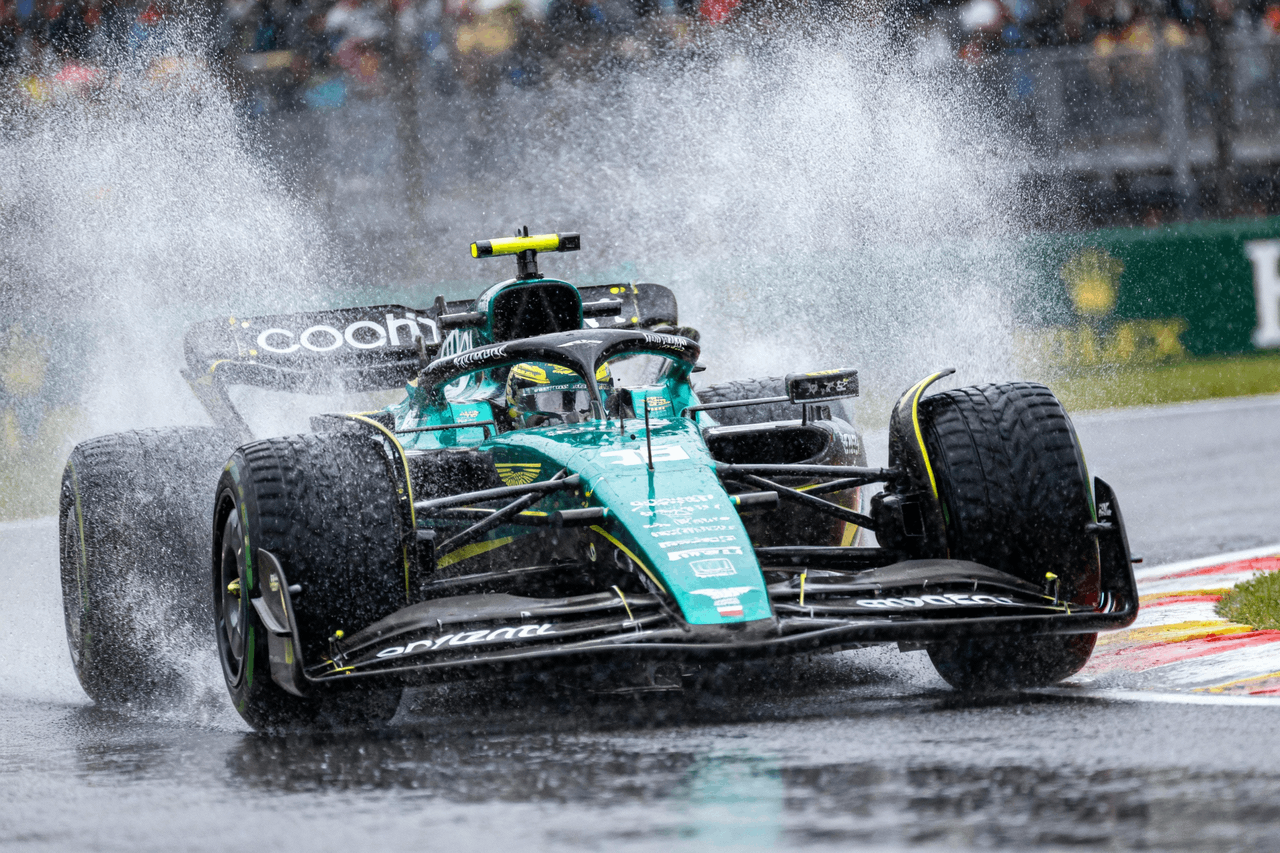 An F1 car speeding through water