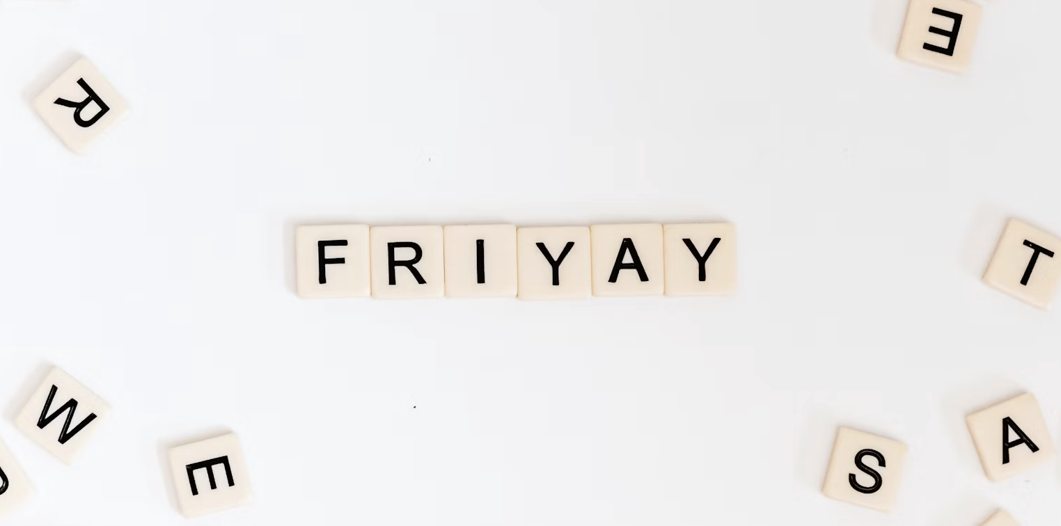 A colorful and vibrant image with the text "Happy Friday Quotes"