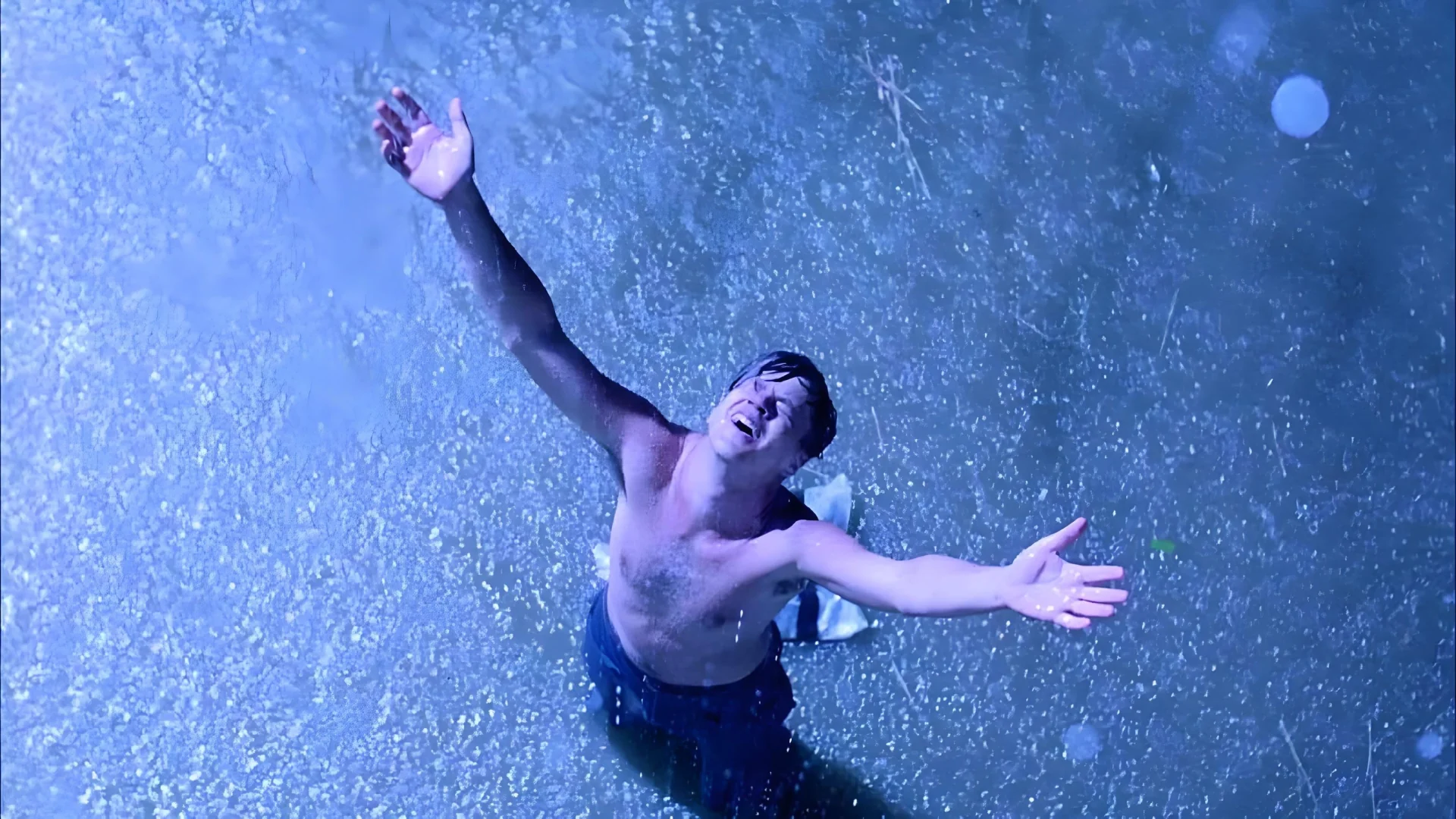 Boom shot drops from above to subject