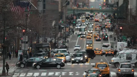 B-roll film transition showing a busy city street