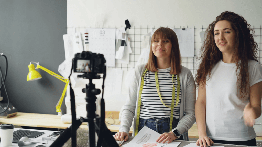 Two creators collaborating to grow their subscriber base