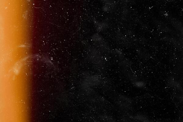 Film texture overlays on video with grain, scratches, and light leaks.
