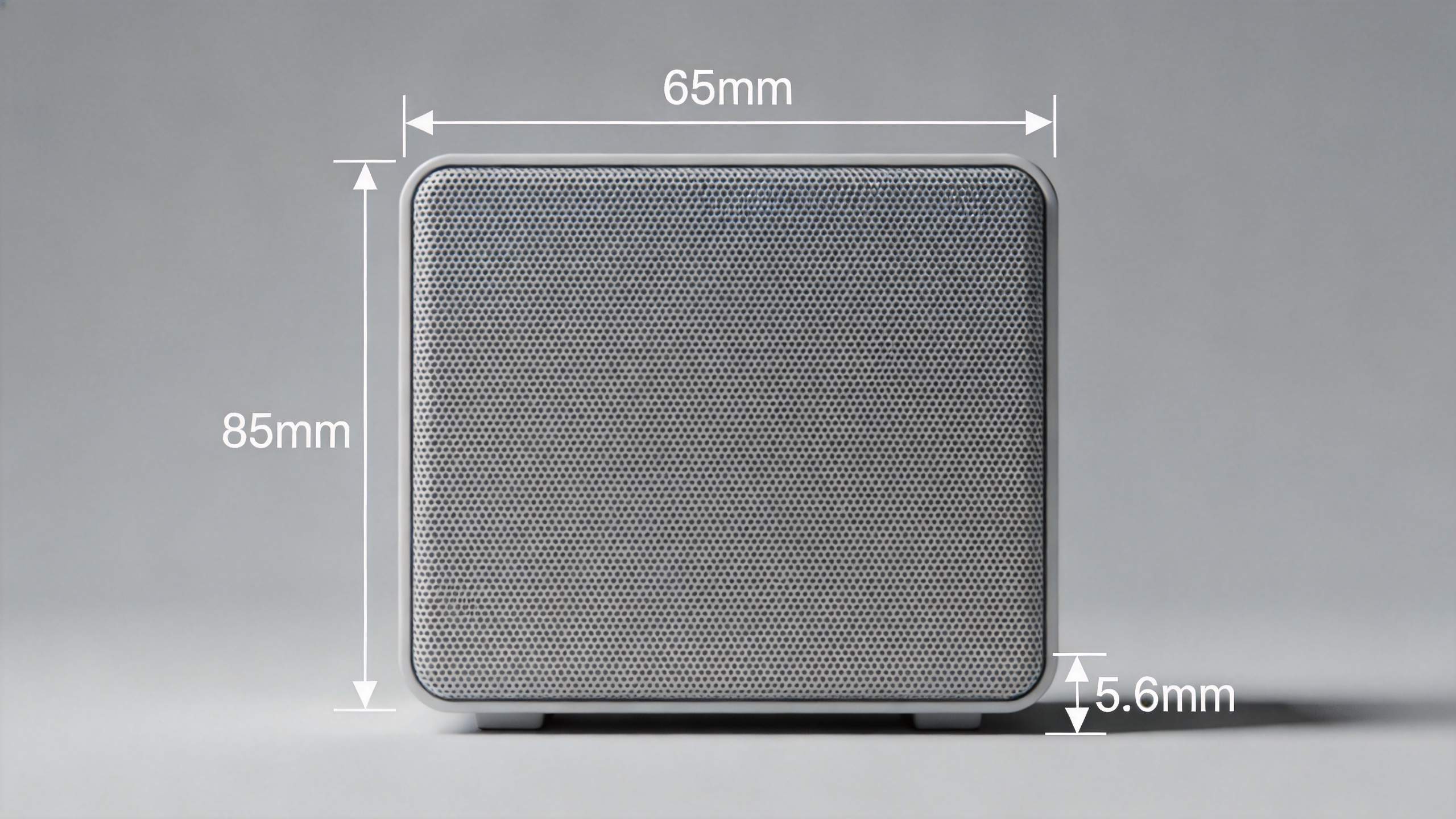 Compact speaker with dimension labels: 65mm wide, 85mm tall, 5.6mm deep
