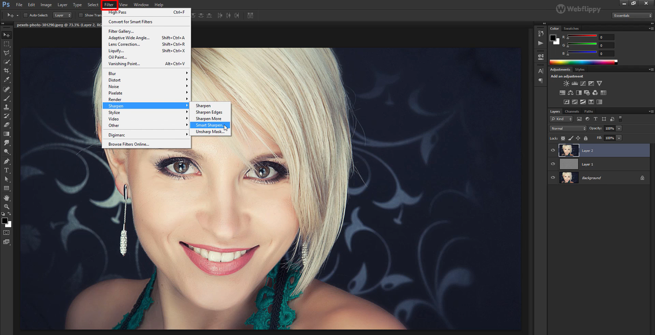 Interface mostrando como corrigir uma imagem borrada no Photoshop usando uma ferramenta de nitidez
