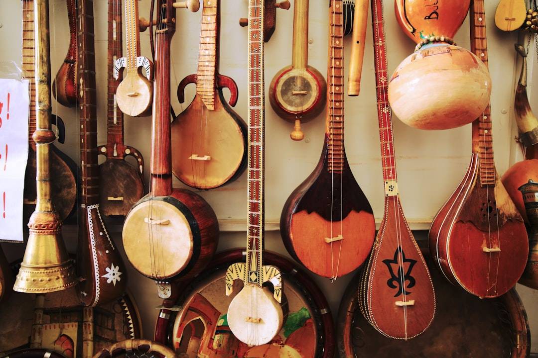 A vibrant collage of musical instruments and sound waves.