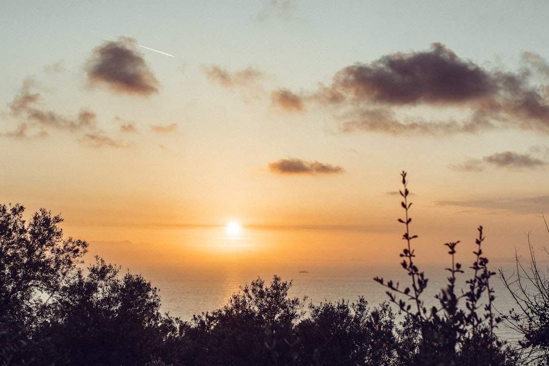 A beautiful sunrise over a calm and serene landscape, symbolizing a new day and fresh start.
