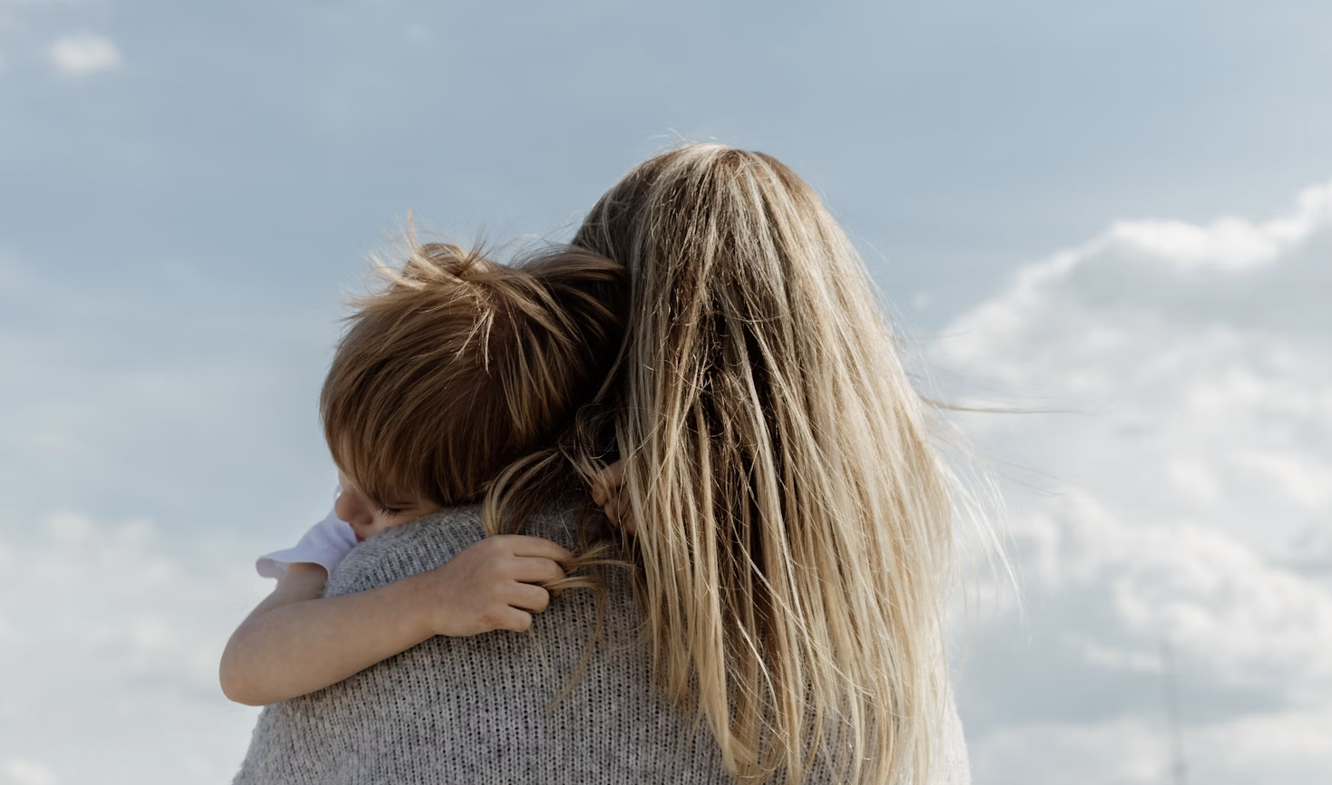 a blurry image of a tent and a campfire
