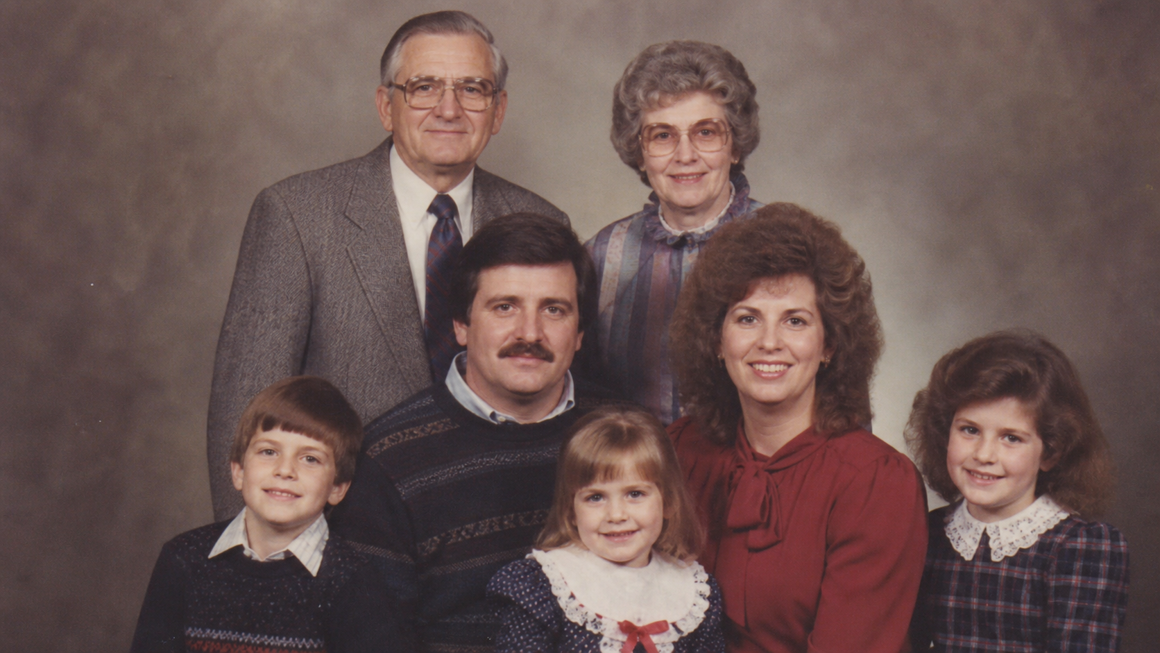 Outdoor family snapshot with 1980s styling