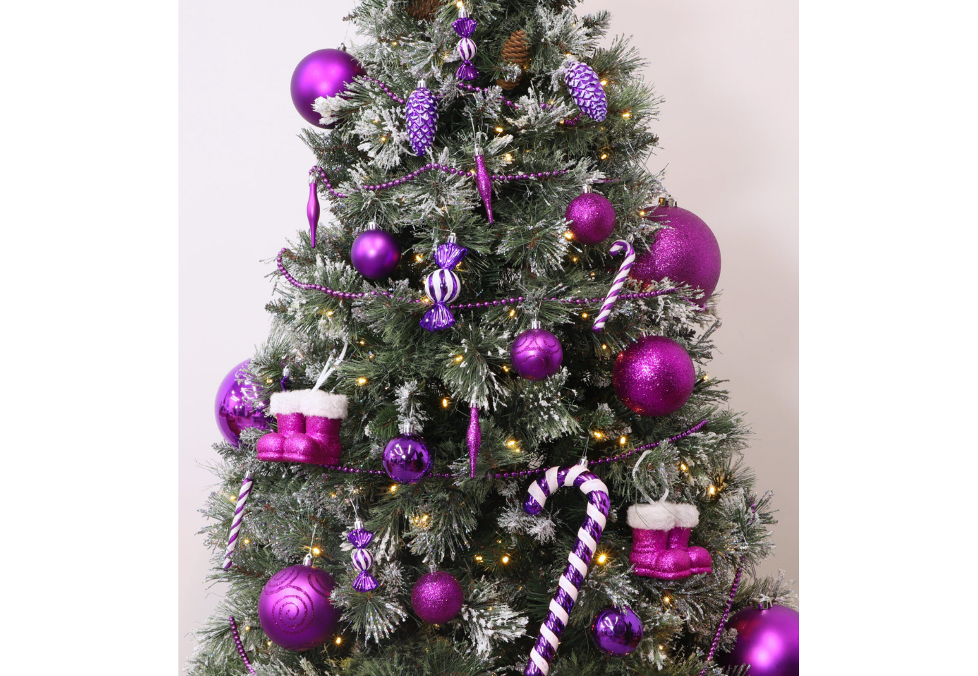 Purple Christmas ornaments on tree