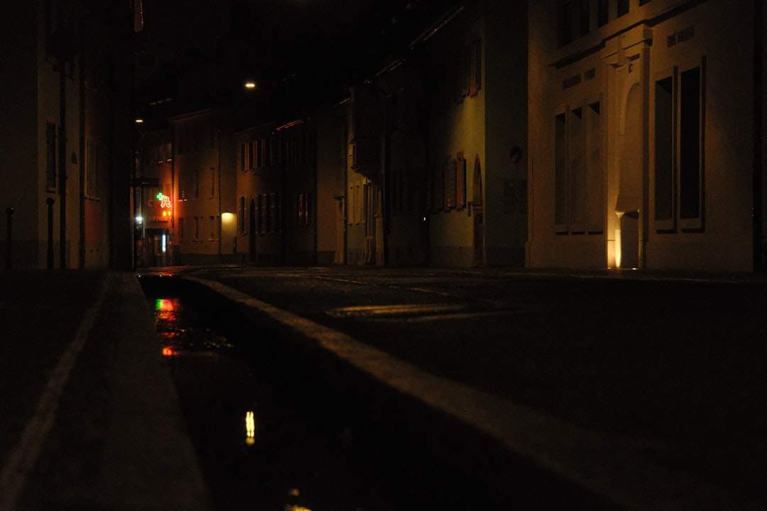 Night street photo enhanced with lifted shadows, reduced haze, and cleaner color