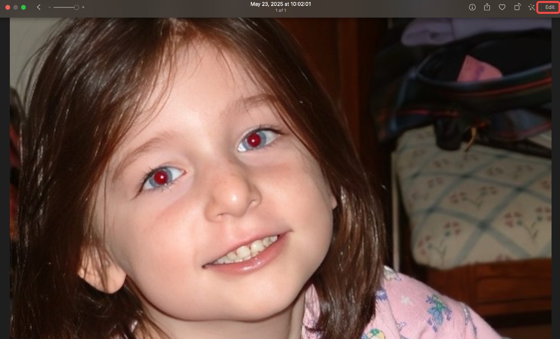 Launch the Photos app and access the red-eye removal tool