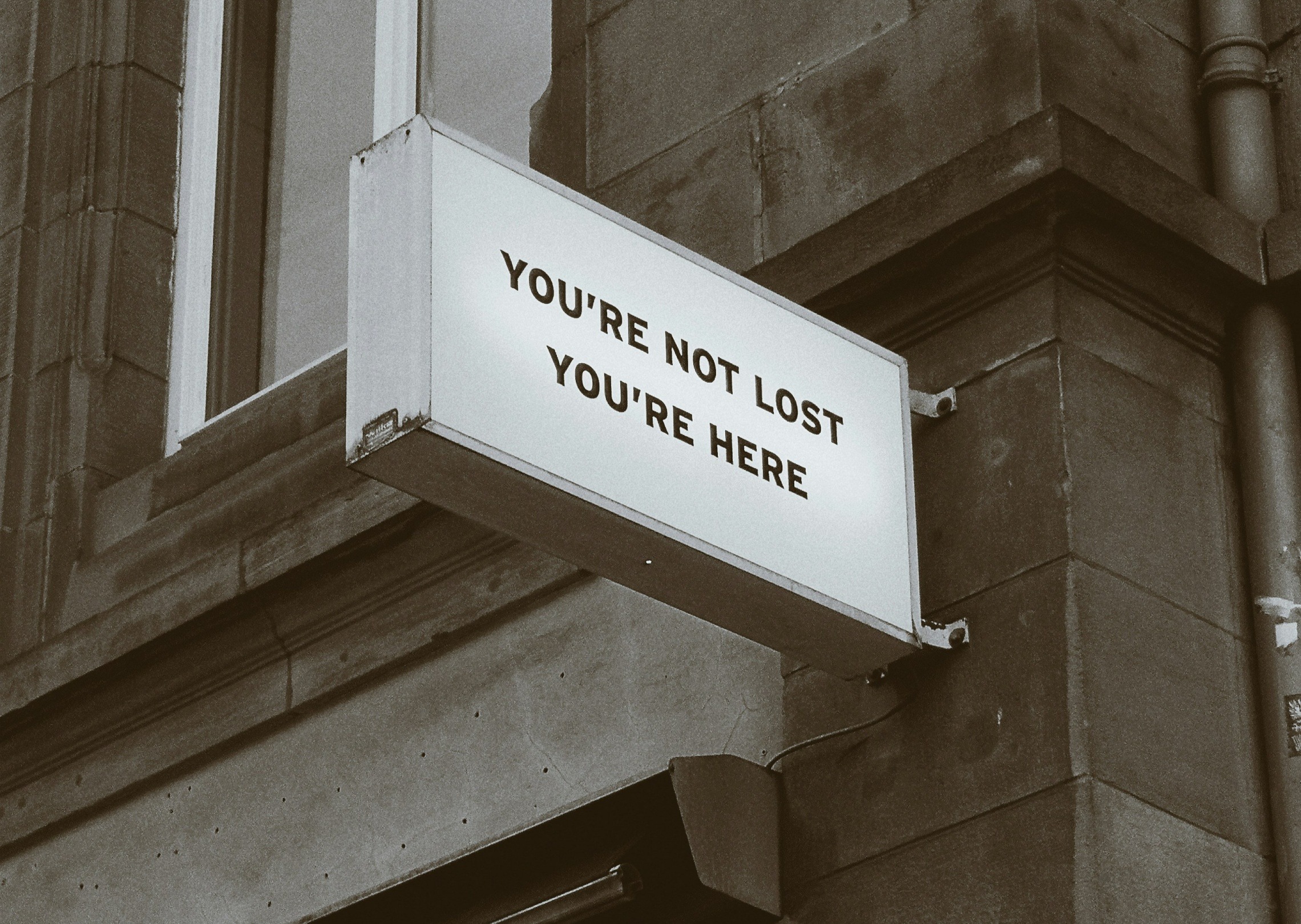 Remove all text from the billboard in the image