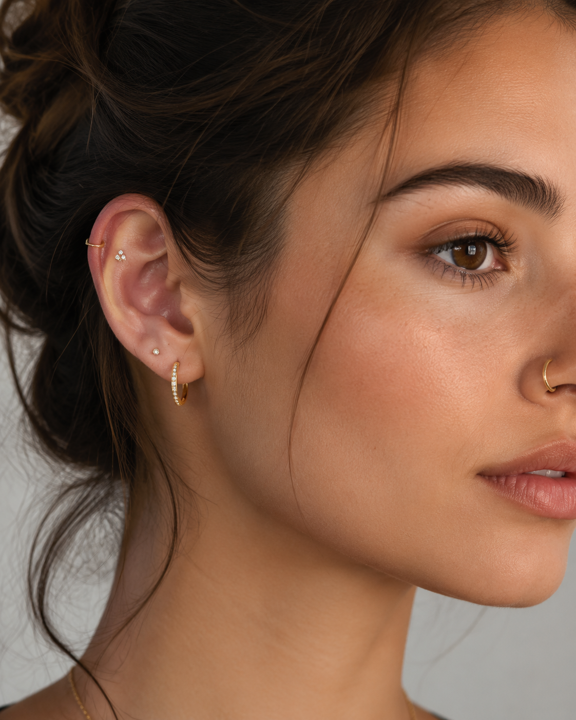 Dreamina virtual piercing try on prompt example 1: Delicate Ear Piercing Preview