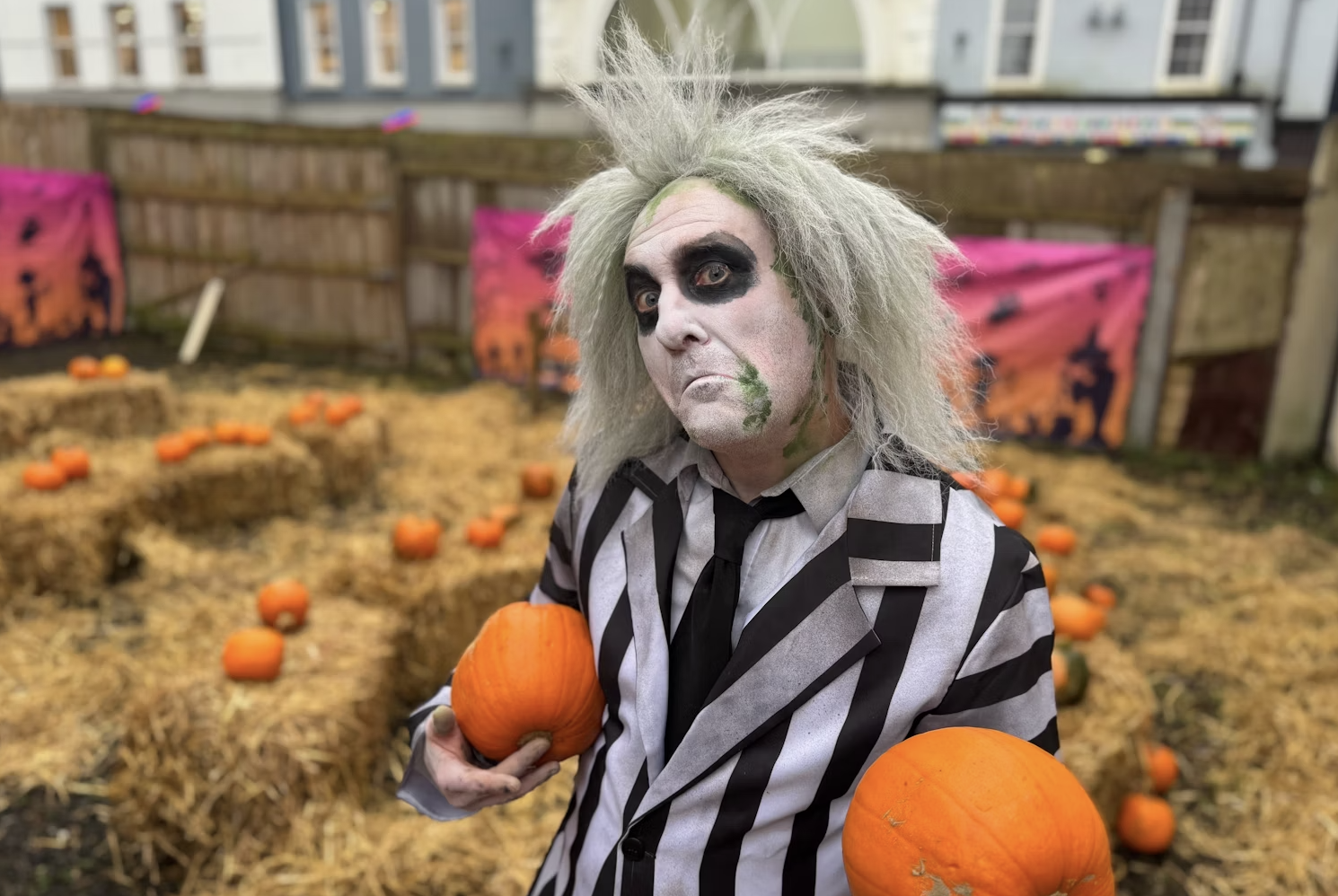 A promotional image for the movie Beetlejuice featuring the main characters.