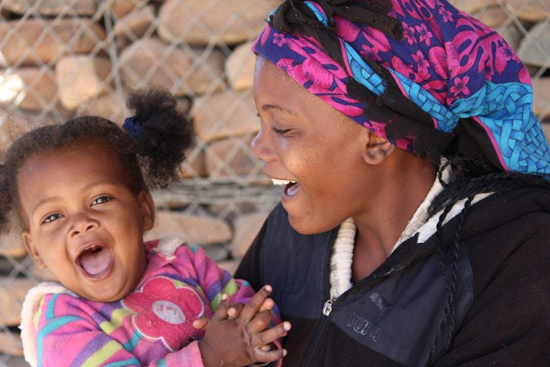 mother and child laughing together