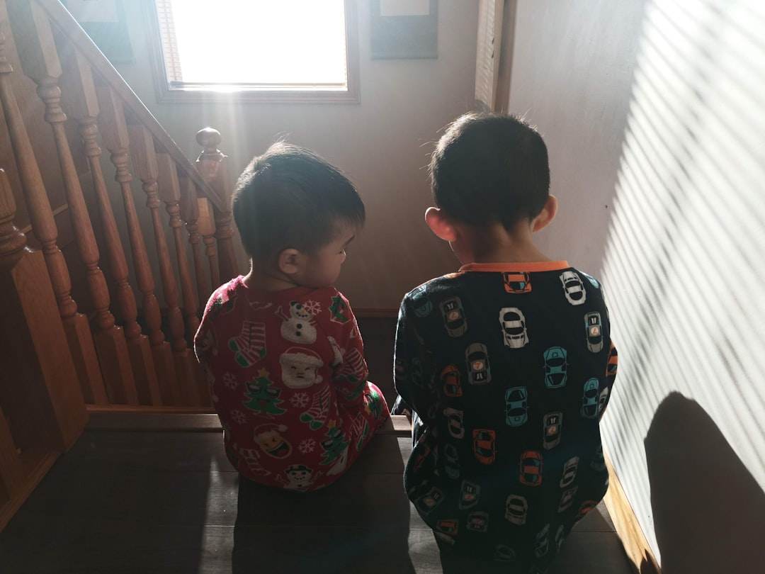 Two brothers playfully teasing each other.