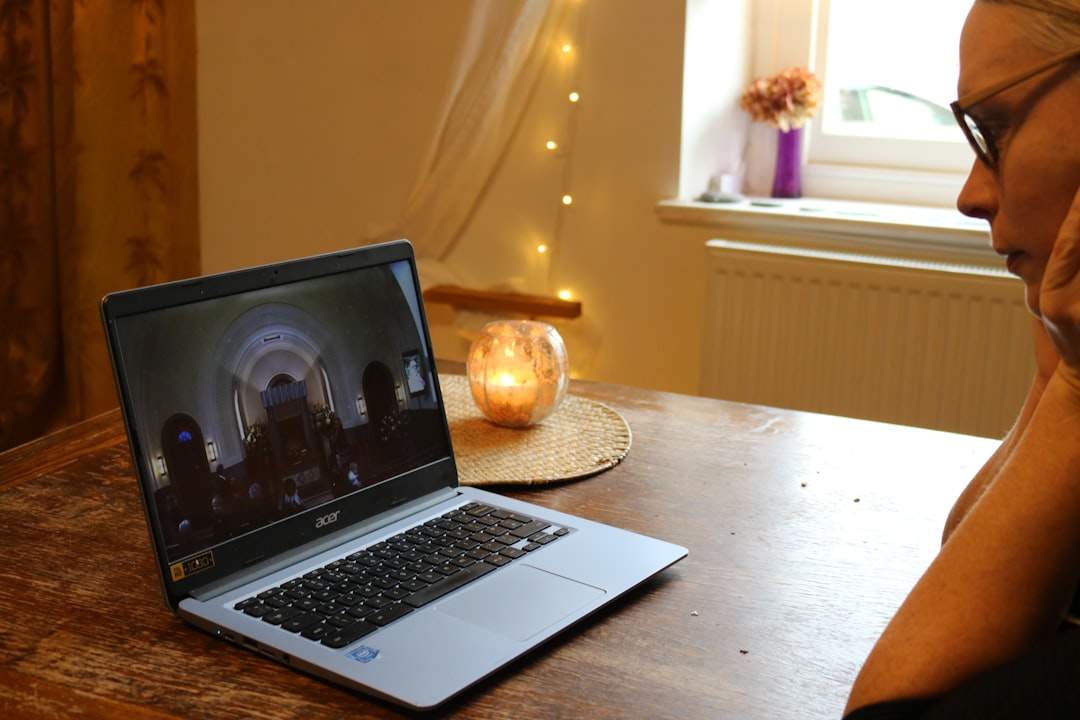SVG cut files preview on a laptop screen with Christmas tree designs