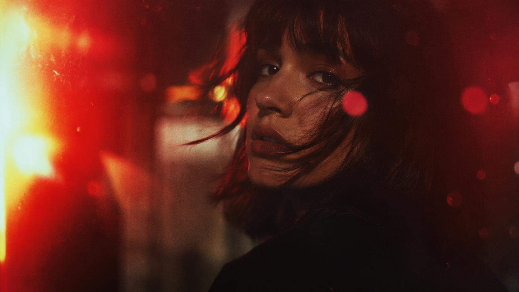Dreamina film burn filter prompt example 6: Cinematic red flare