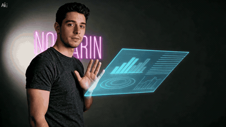 Selfie animates with floating holographic panels and a glowing personalized name around the subject.