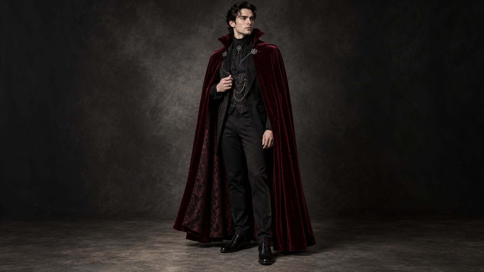Vampire costume idea: Fictional adult modelling burgundy vampire cape and subtle gothic accessories, full-body editorial fashion photo