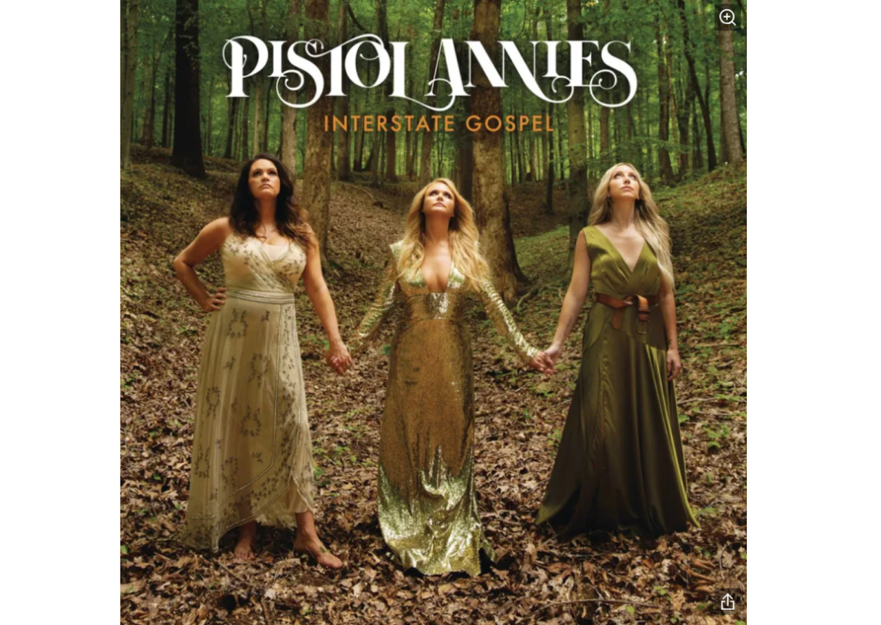 Pistol Annies standing in forest with clasped hands