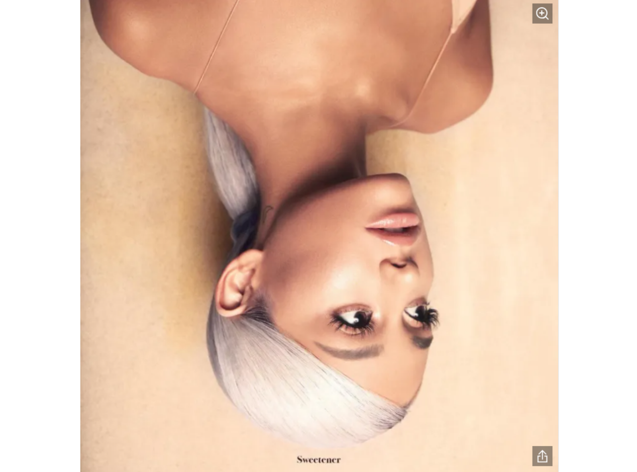 Ariana Grande upside-down with playful, surreal pose