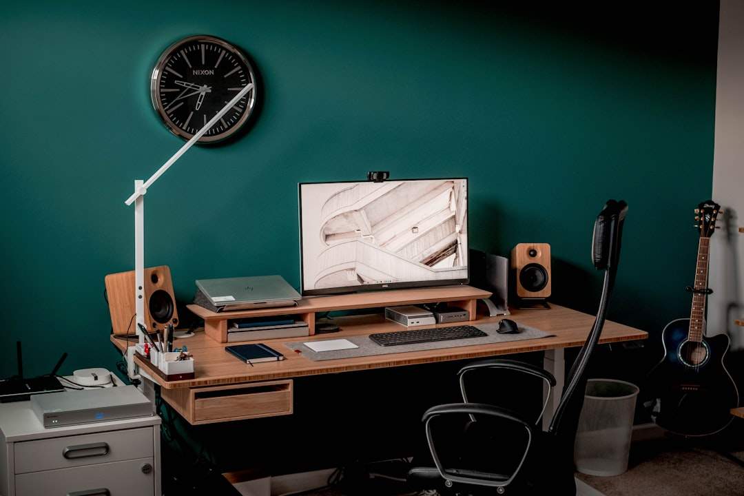 Studio desk with LED panels and green backdrop