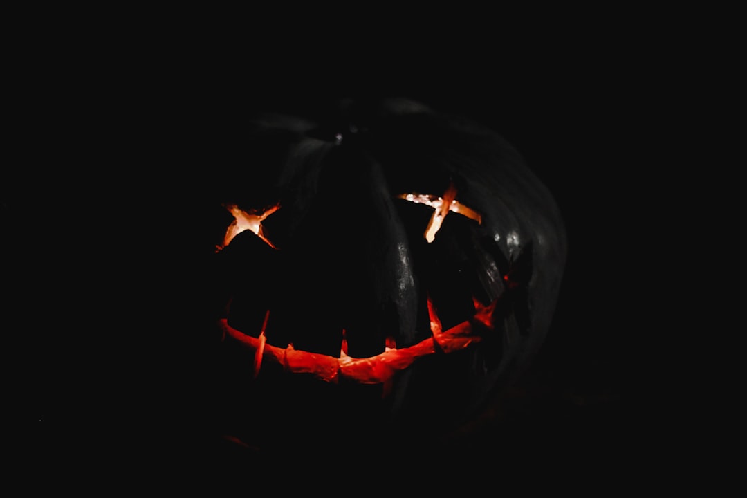 A stylized graphic of a sinister smile.