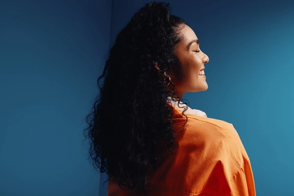 Portrait with textured background that adds subtle depth