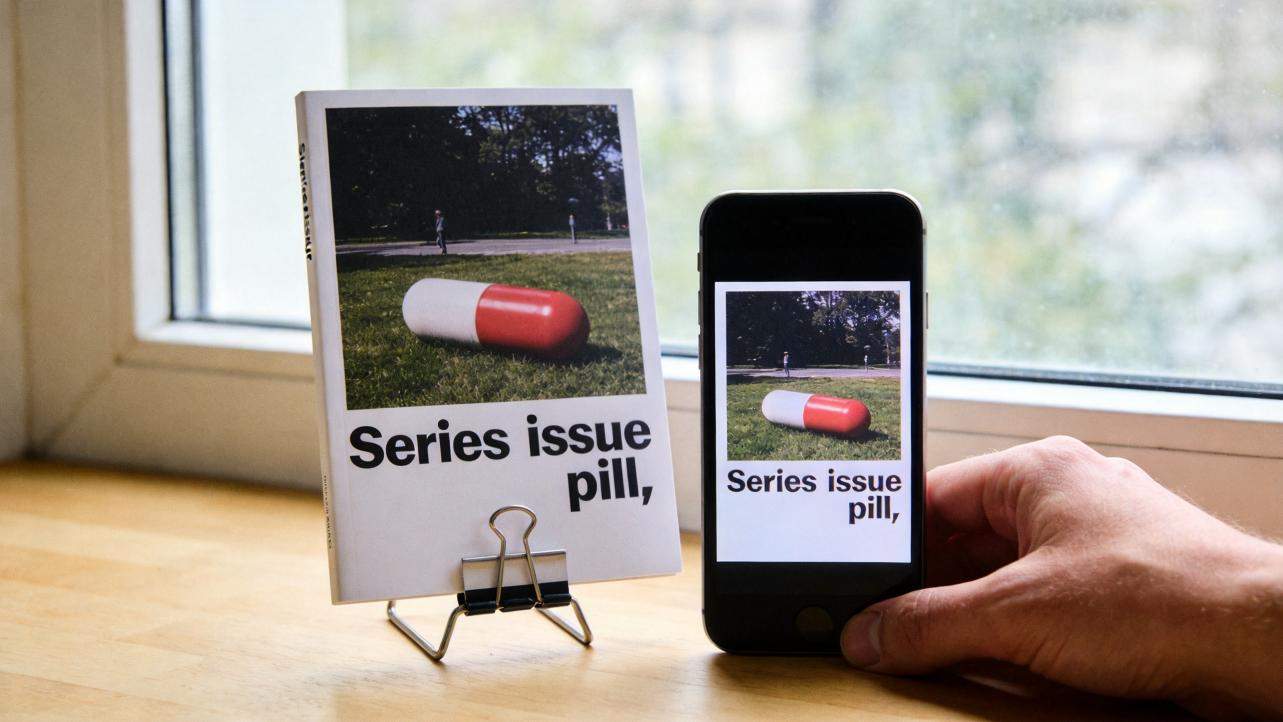 Newsletter cover shown on a card and phone, both with a red-and-white pill photo and the words "Series issue pill".
