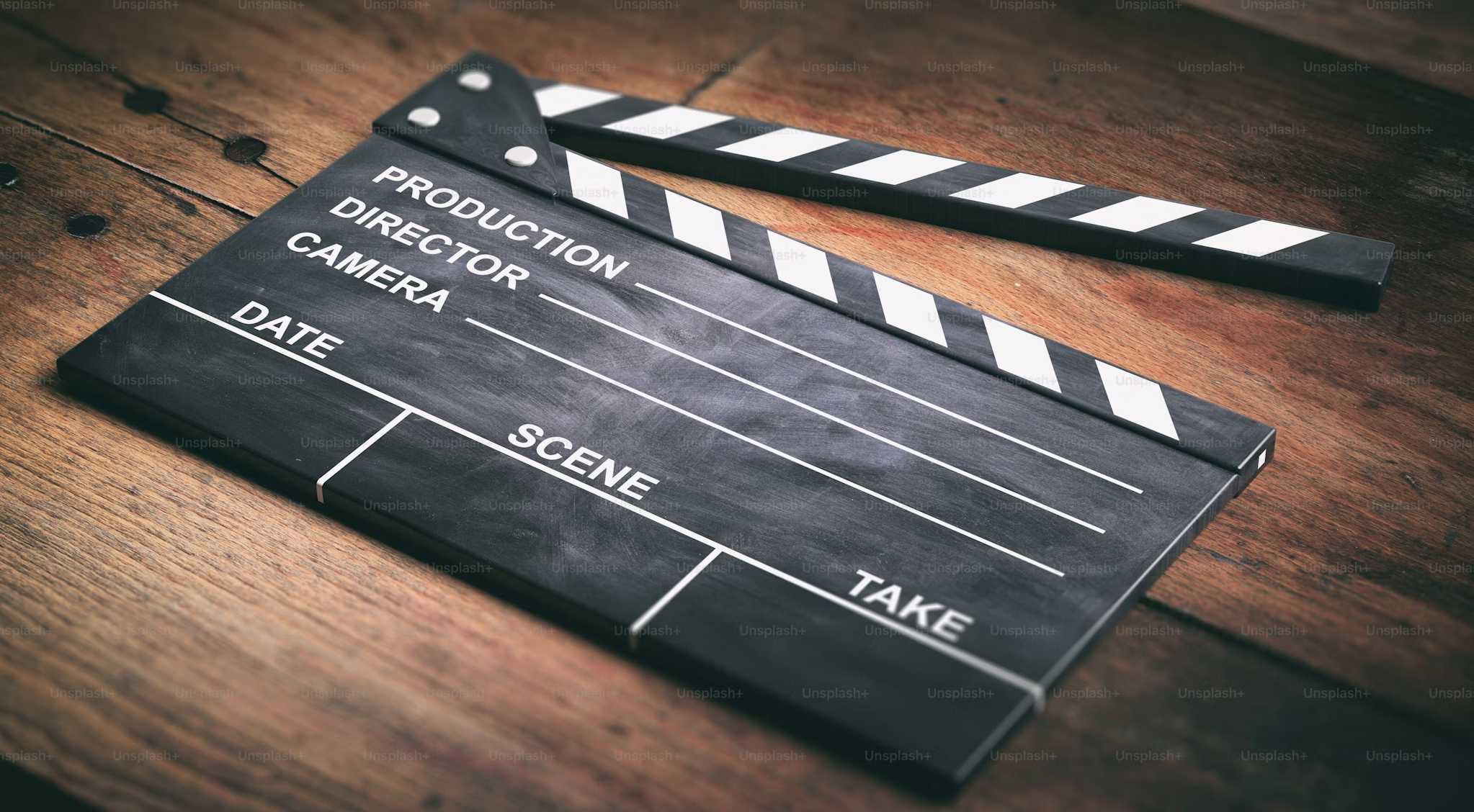 A collage of memorable film quotes with a director's clapperboard in the center, and various movie scenes in the background.