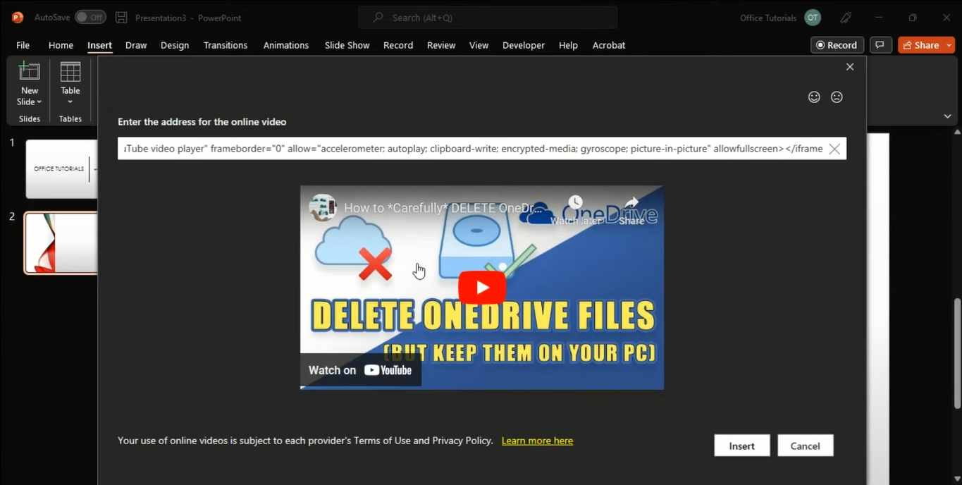 Pasting the embed code to insert a YouTube video into PowerPoint