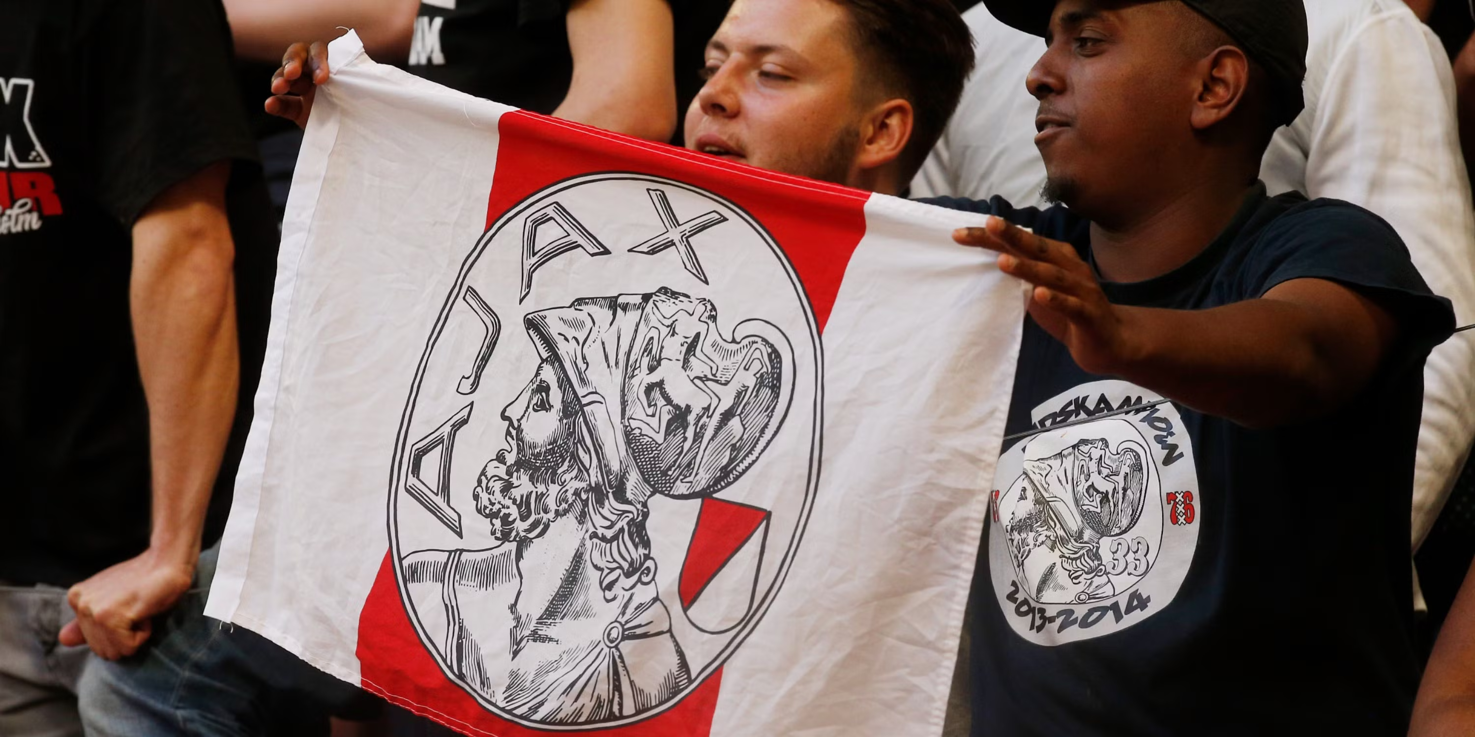 soccer badge waving at football event